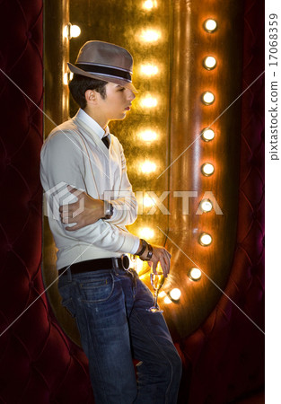 young man with glass of wine 17068359
