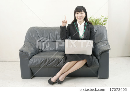 A woman who makes internet on the sofa A woman who makes internet on the sofa 17072403