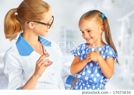 Doctor a pediatrician makes child vaccinated 17073630