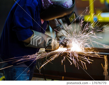 Electric wheel grinding on steel structure 17076770