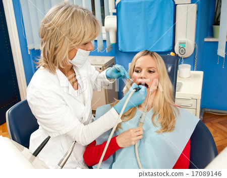 woman dentist at work woman dentist at work 17089146