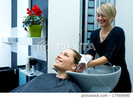 woman drying hair with towel woman drying hair with towel 17089890