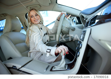 attractive blond woman in driver seat attractive blond woman in driver seat 17090018