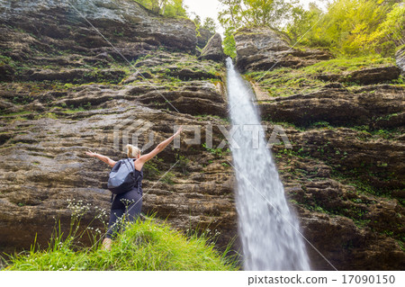 Active sporty woman relaxing in beautiful nature. 17090150