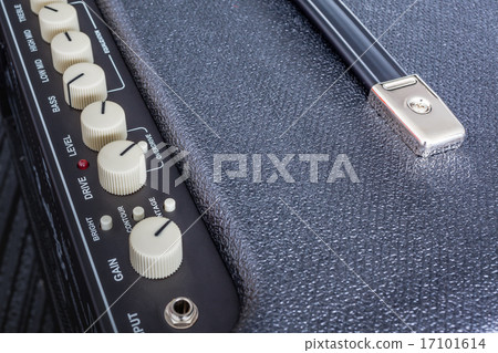 Button of Guitar Power Amplifier, closeup Button of Guitar Power Amplifier, closeup 17101614