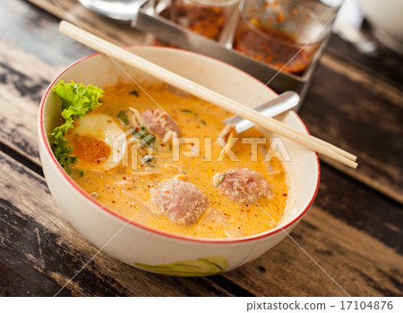 Pork noodle tom yum on wood table 17104876