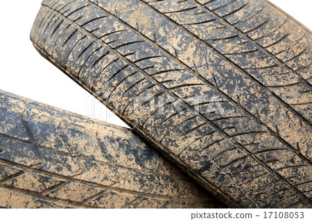Stack of grunge car tire with brown dirt 17108053