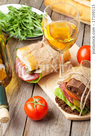 Two sandwiches and white wine Two sandwiches and white wine 17109115