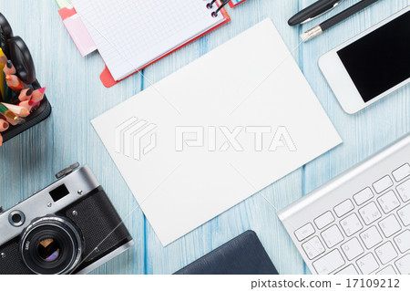 Office desk with supplies, camera and blank card Office desk with supplies, camera and blank card 17109212