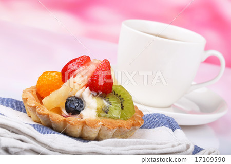 One fruit cake and teacup 17109590