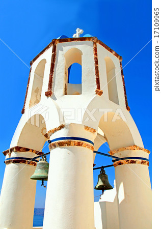 Bell tower of white church on blue sky background Bell tower of white church on blue sky background 17109965