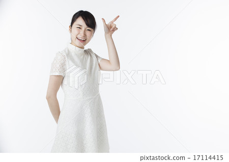 Female finger pointing pose 17114415