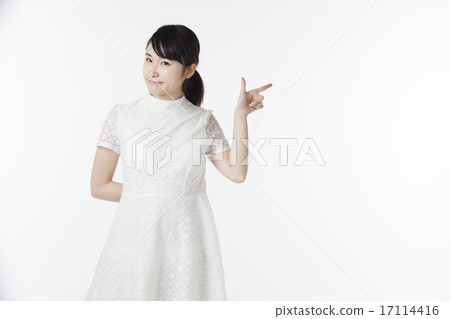 Female finger pointing pose 17114416