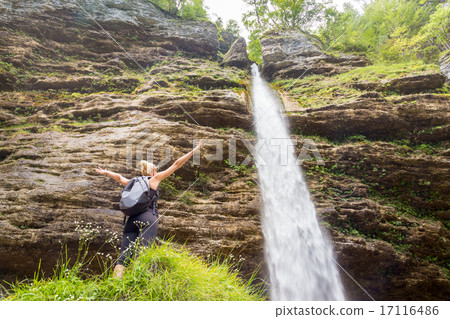 Active sporty woman relaxing in beautiful nature. Active sporty woman relaxing in beautiful nature. 17116486