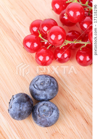 Berries on wooden board 17118296