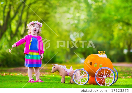 Little girl at pumpkin patch at Halloween Little girl at pumpkin patch at Halloween 17123275