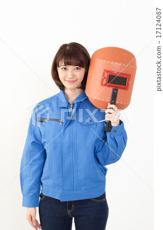 Female worker with welding mask 17124087