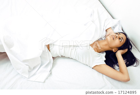 pretty real mulatto brunette woman in bed, cant sleep mad look close up 17124895