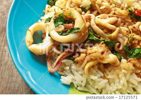 squids fried with chilli pepper and sweet basil on rice squids fried with chilli pepper and sweet basil on rice 17125571