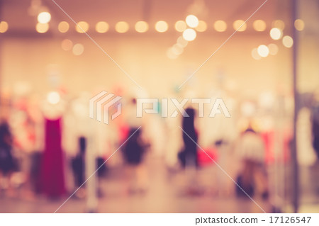Blurred image of people in shopping mall with bokeh 17126547