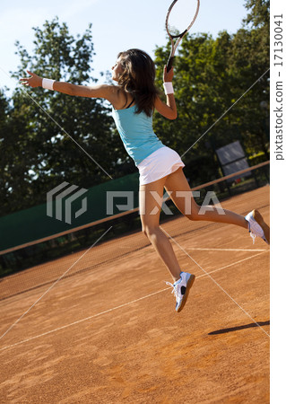 Playing tennis, summertime saturated theme Playing tennis, summertime saturated theme 17130041