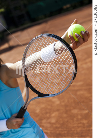 Woman playing tennis in summer Woman playing tennis in summer 17130065
