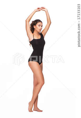 Stunning young woman with curly hair in black swimsuit Stunning young woman with curly hair in black swimsuit 17133103