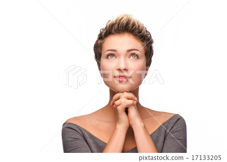 Woman with copper-colored hair praying Woman with copper-colored hair praying 17133205
