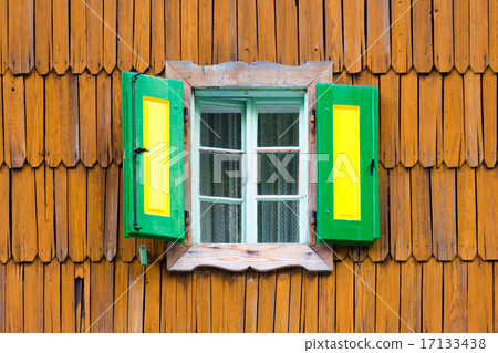Colorful vintage wooden window shutters. 17133438