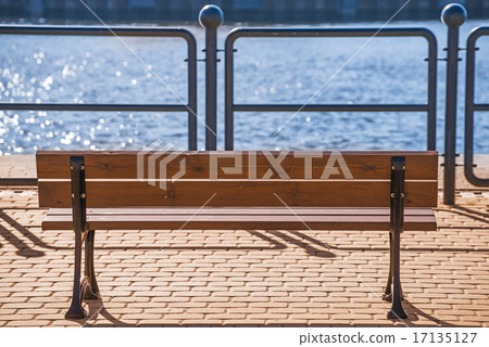 park bench at a seaport park bench at a seaport 17135127