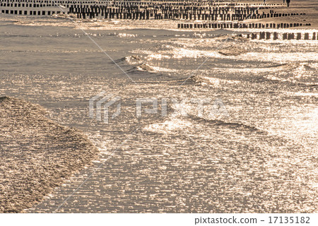 Sunrise over the Baltic Sea with groins Sunrise over the Baltic Sea with groins 17135182