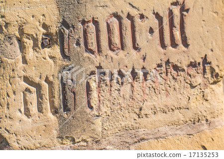 penitence cross with old medieval abbey wall penitence cross with old medieval abbey wall 17135253