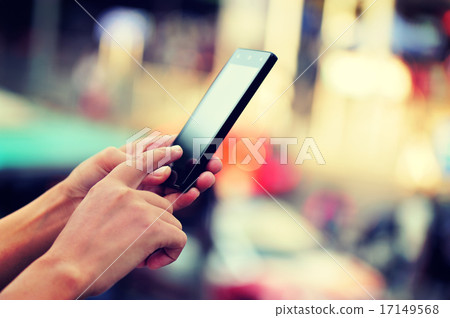 woman hands use smart phone in modern city woman hands use smart phone in modern city 17149568