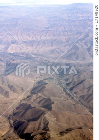Look over the countryside of the mountain village in the valley of the Andean Chile from Chile, South America Look over the countryside of the mountain village in the valley of the Andean Chile from Chile, South America 17149920