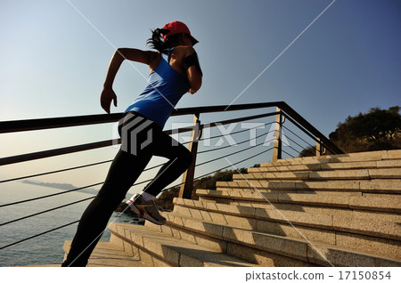 healthy lifestyle sports woman running up on stair 17150854