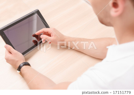 Hands of a man with tablet Hands of a man with tablet 17151779