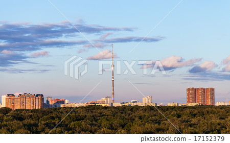 pink clouds in evening blue sky over city 17152379