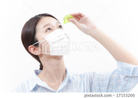 A woman representing an eye drop 17153200
