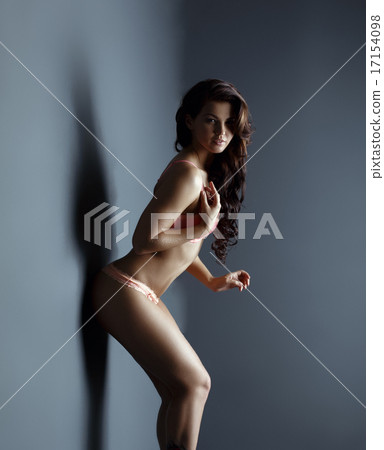 Slender young brunette posing in underwear 17154098