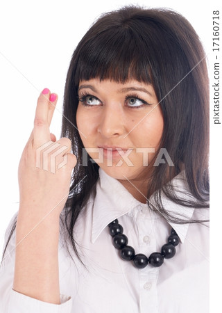 Pretty girl with crossed fingers 17160718