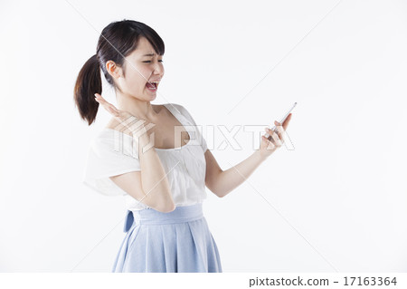 Female finger pointing pose 17163364