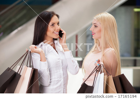 Beautiful young women are going shopping with joy Beautiful young women are going shopping with joy 17165194