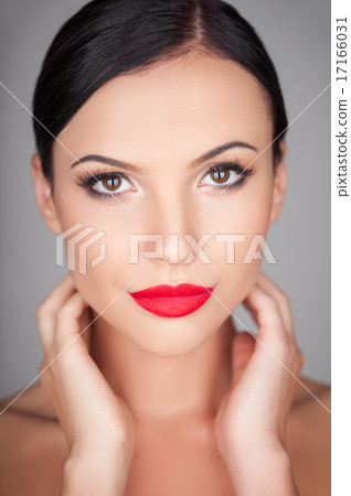 Beautiful young girl is flirting with someone Beautiful young girl is flirting with someone 17166031