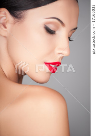 Beautiful young woman is caring of her skin Beautiful young woman is caring of her skin 17166032