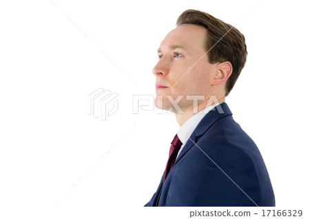 A thoughtful businessman looking away A thoughtful businessman looking away 17166329
