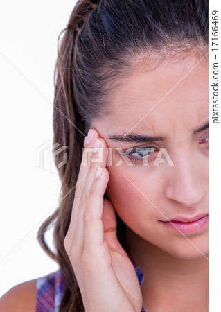 A pretty brunette with headache 17166469