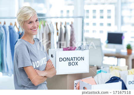 Smiling young female volunteer 17167518