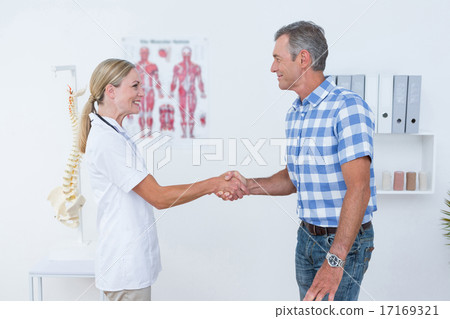 Patient shaking hands with doctor 17169321