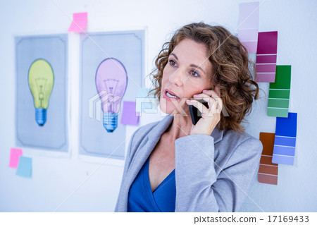 Creative businesswoman having phone call Creative businesswoman having phone call 17169433