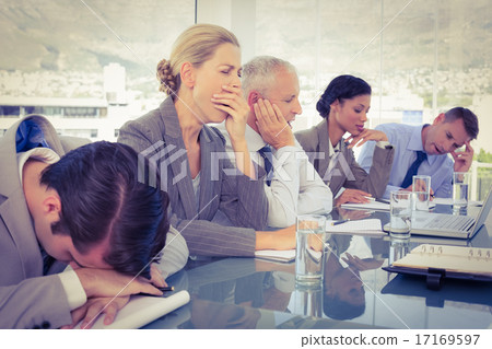 Tired business team at conference Tired business team at conference 17169597